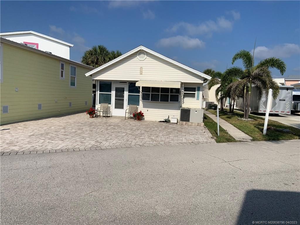 Photo of 1196 Nettles Boulevard, Jensen Beach, FL 34957 (MLS # M20038795)
