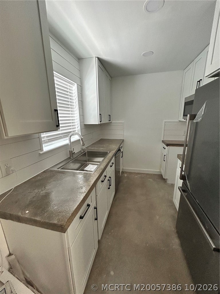 Photo of 1825 NE Dixie Highway #2, Jensen Beach, FL 34957 (MLS # M20057386)
