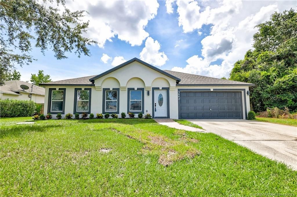 Photo of 3662 SW Vollmer Street, Port Saint Lucie, FL 34953 (MLS # M20040224)