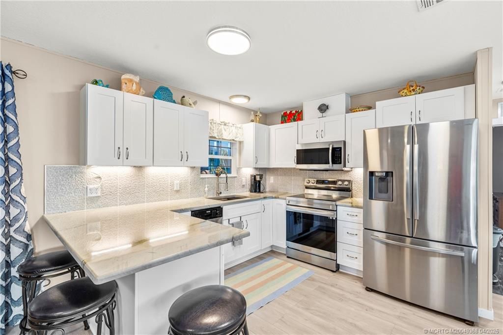 Photo of 195 SE Riverbend Street, Stuart, FL 34997 (MLS # M20049368)