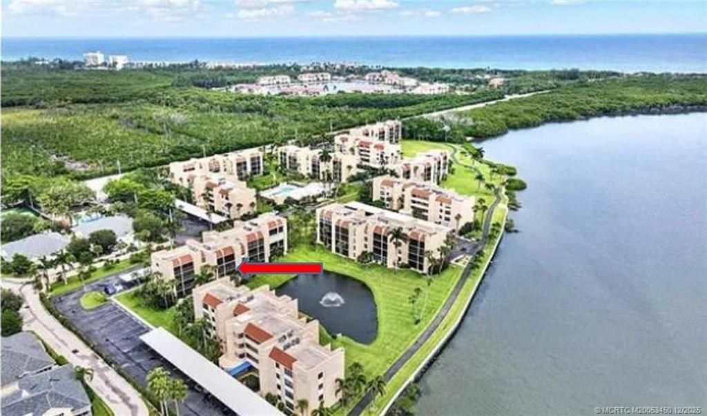 Photo of 3392 NE Causeway Boulevard #303, Jensen Beach, FL 34957 (MLS # M20053450)