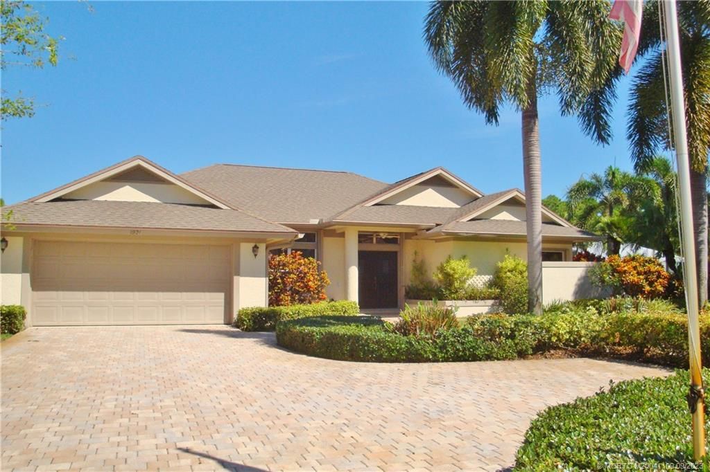 Photo of 1921 SW Oak Ridge Road, Palm City, FL 34990 (MLS # M20041109)