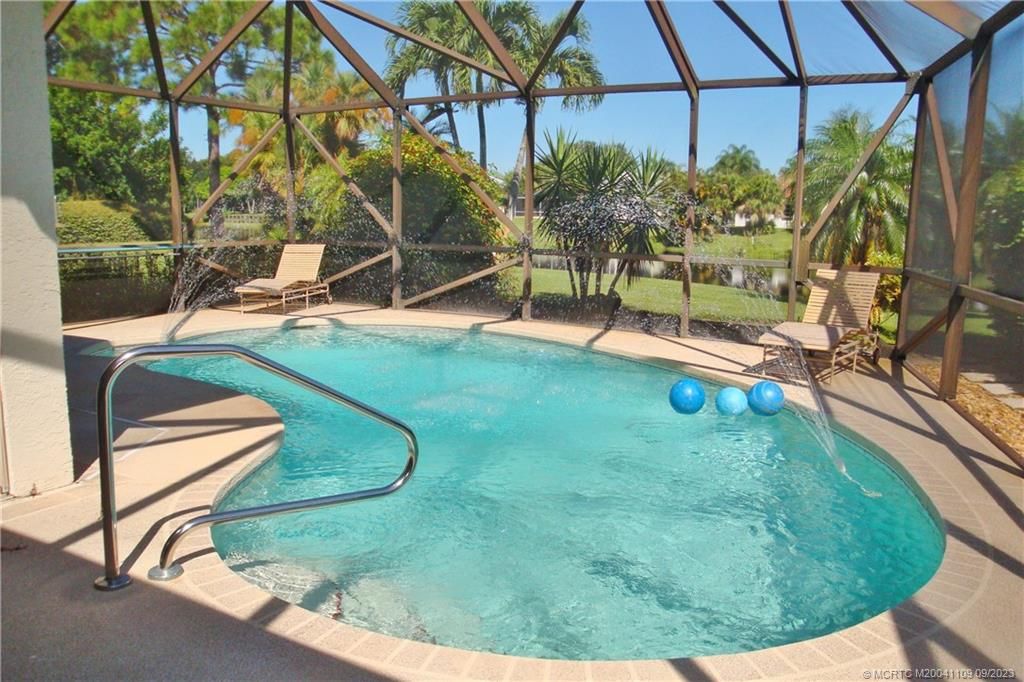 Photo of 1921 SW Oak Ridge Road, Palm City, FL 34990 (MLS # M20041109)