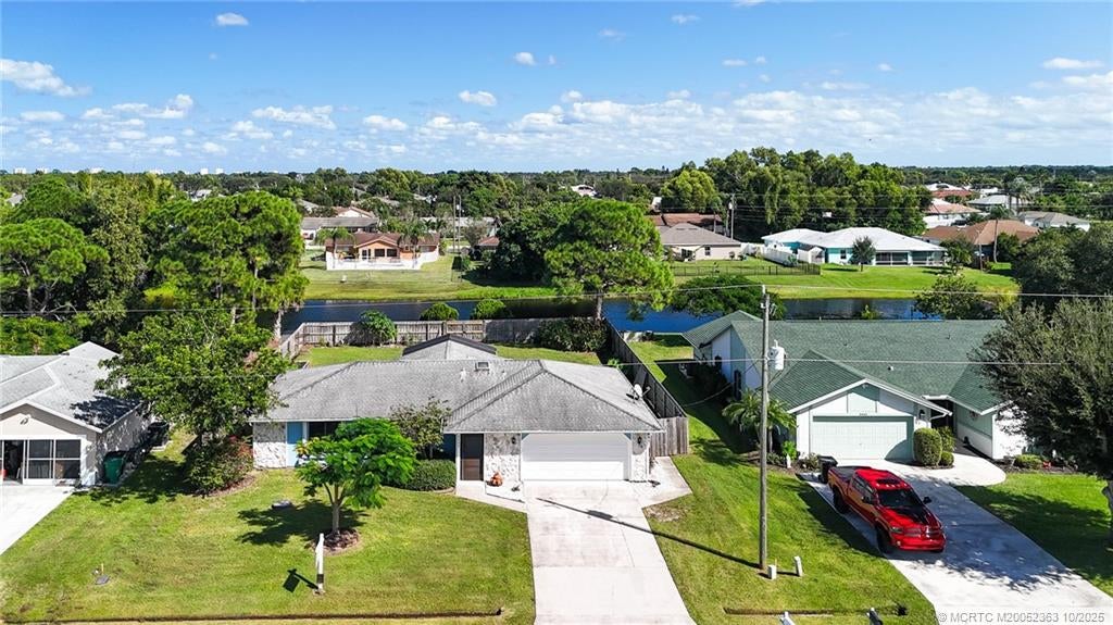 Photo of 2433 SE Hallahan Street, Port Saint Lucie, FL 34952 (MLS # M20052363)