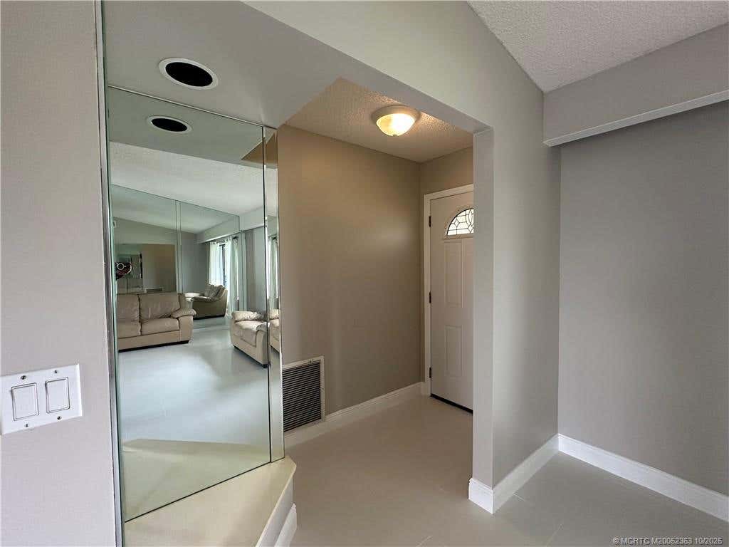 Photo of 2433 SE Hallahan Street, Port Saint Lucie, FL 34952 (MLS # M20052363)