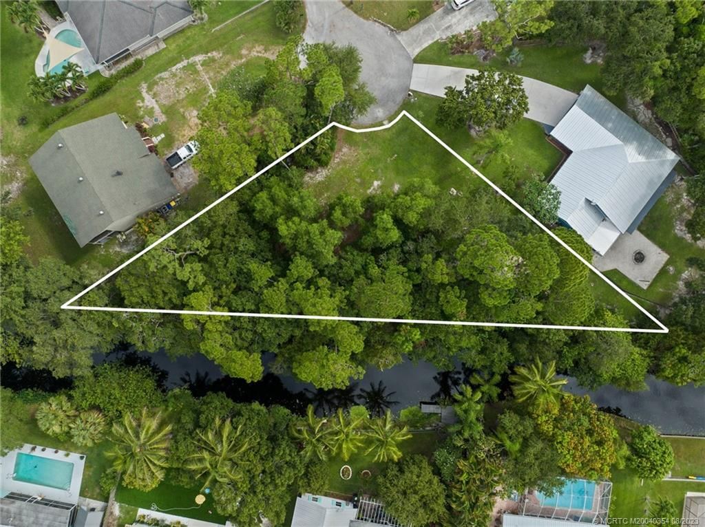Photo of 7809 SE River Lane, Stuart, FL 34997 (MLS # M20040354)