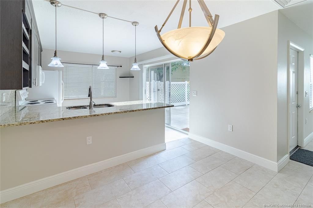 Photo of 3225 SW Sunset Trace Circle, Palm City, FL 34990 (MLS # M20047613)