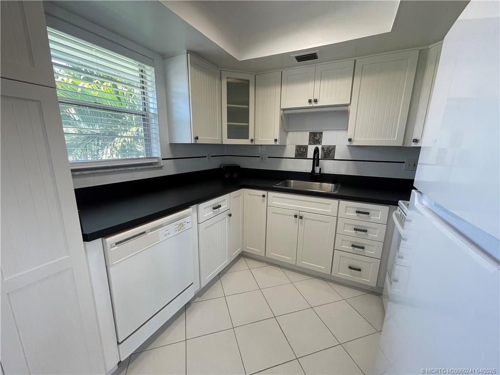 Photo of 2929 SE Ocean Boulevard #10 Building 106, Stuart, FL 34996 (MLS # M20050241)