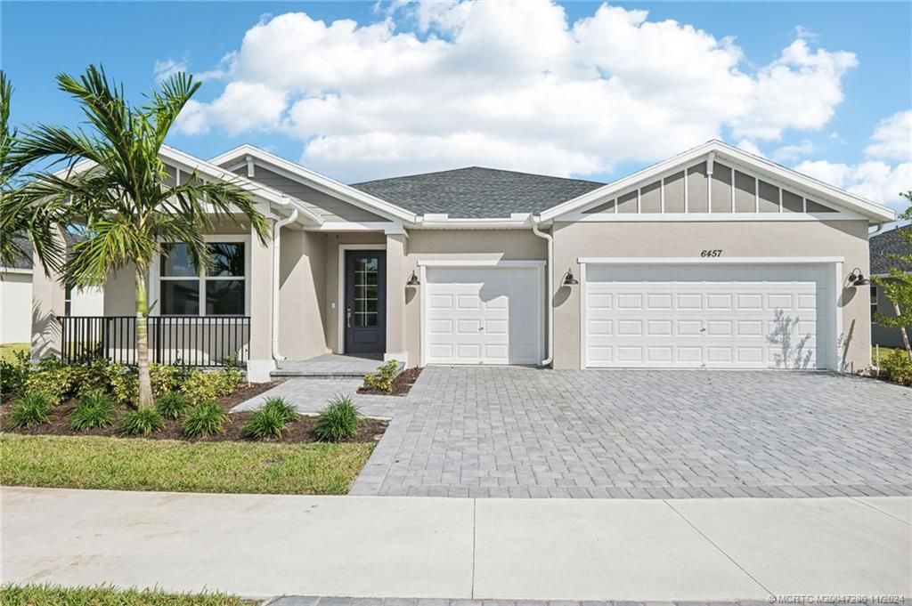 Photo of 6457 NW Cloverdale Avenue, Port Saint Lucie, FL 34981 (MLS # M20047280)