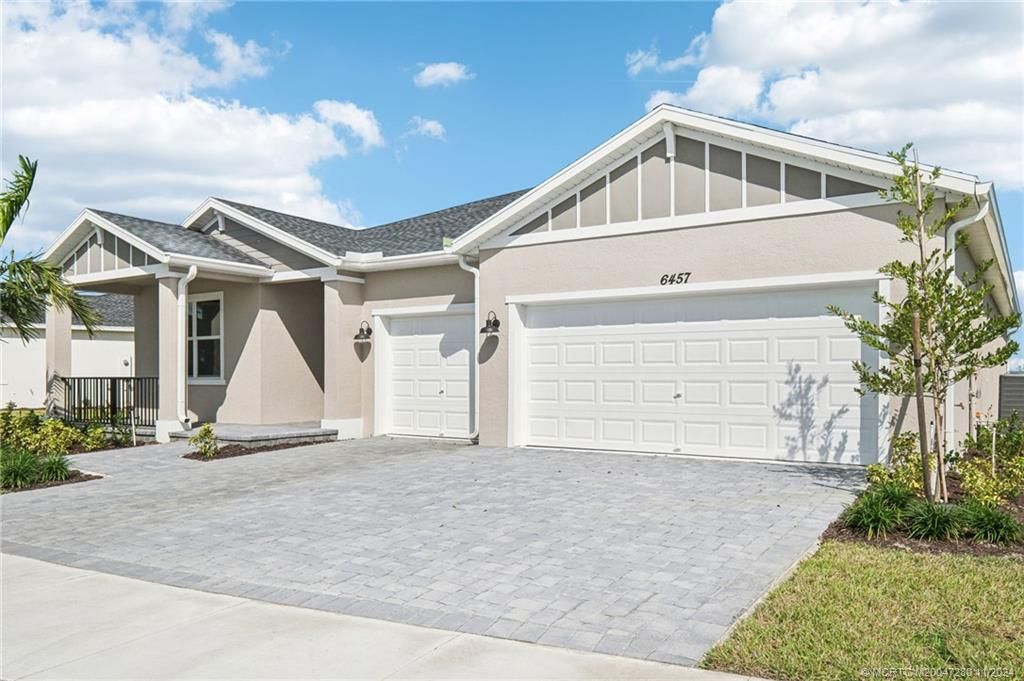 Photo of 6457 NW Cloverdale Avenue, Port Saint Lucie, FL 34981 (MLS # M20047280)
