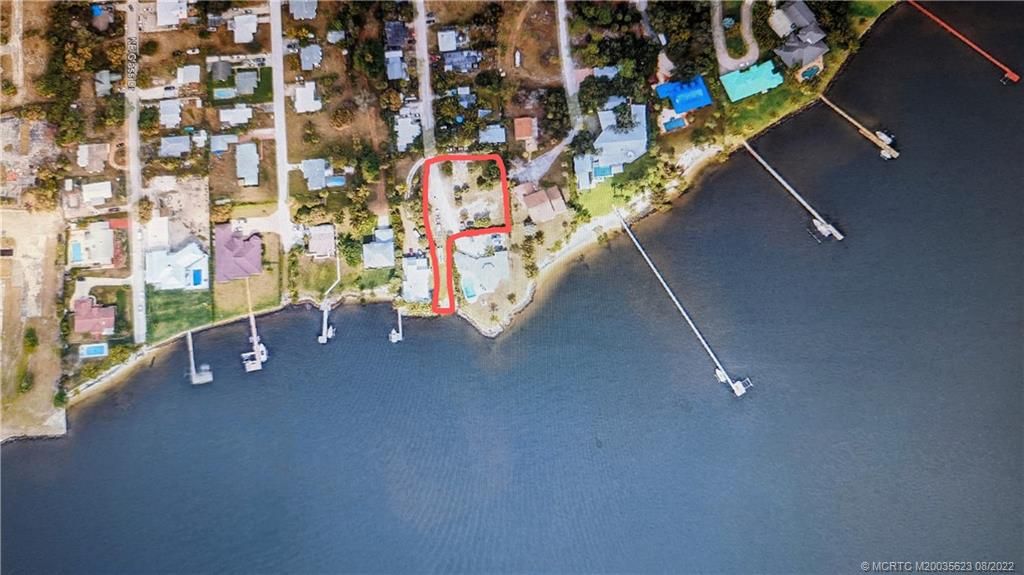 Photo of 1024 NE Orange Avenue, Jensen Beach, FL 34957 (MLS # M20035623)