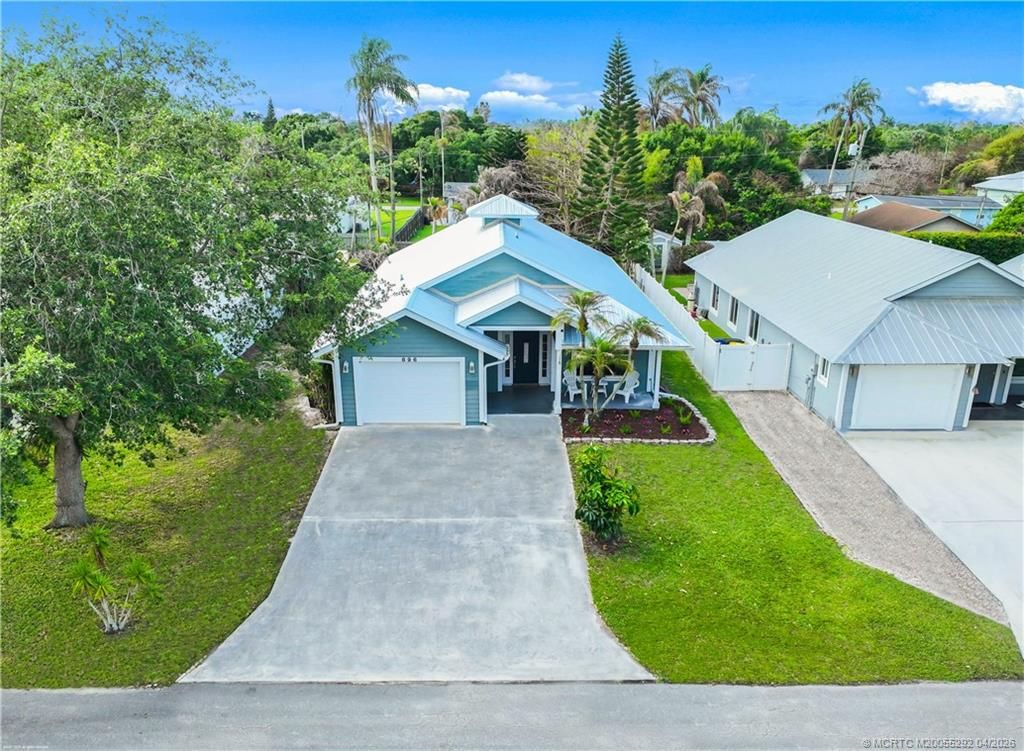 Photo of 896 SW 34th Terrace, Palm City, FL 34990 (MLS # M20055292)