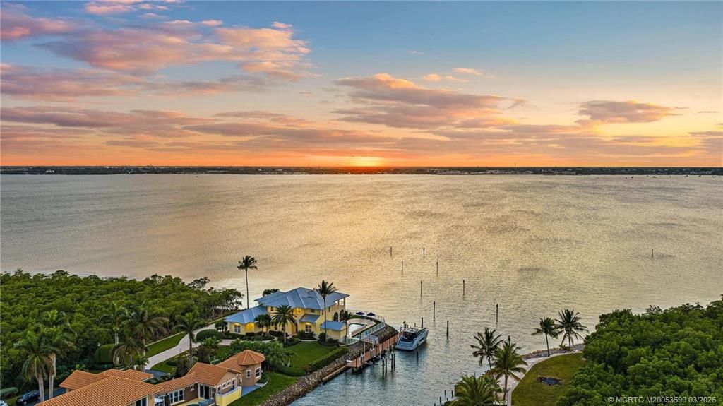 Photo of 4105 NE Rigels Cove Way, Jensen Beach, FL 34957 (MLS # M20053599)