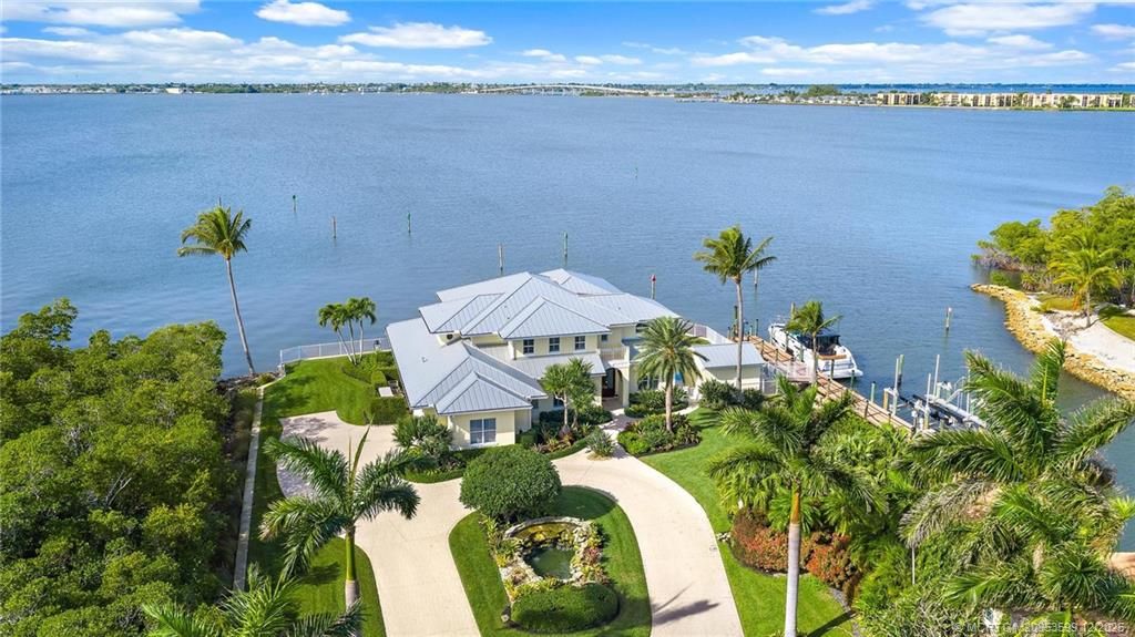 Photo of 4105 NE Rigels Cove Way, Jensen Beach, FL 34957 (MLS # M20053599)