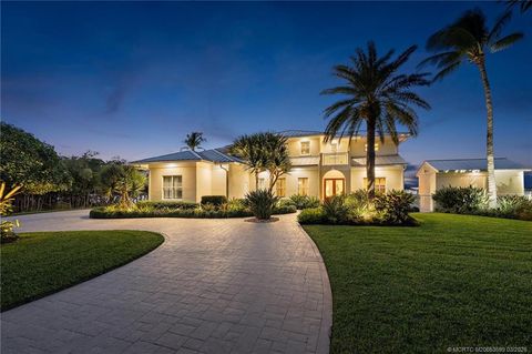 Photo of 4105 NE Rigels Cove Way, Jensen Beach, FL 34957 (MLS # M20053599)