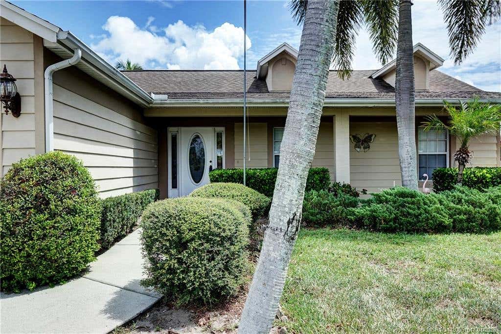 Photo of 1891 SW Idaho Lane, Port Saint Lucie, FL 34953 (MLS # M20051917)