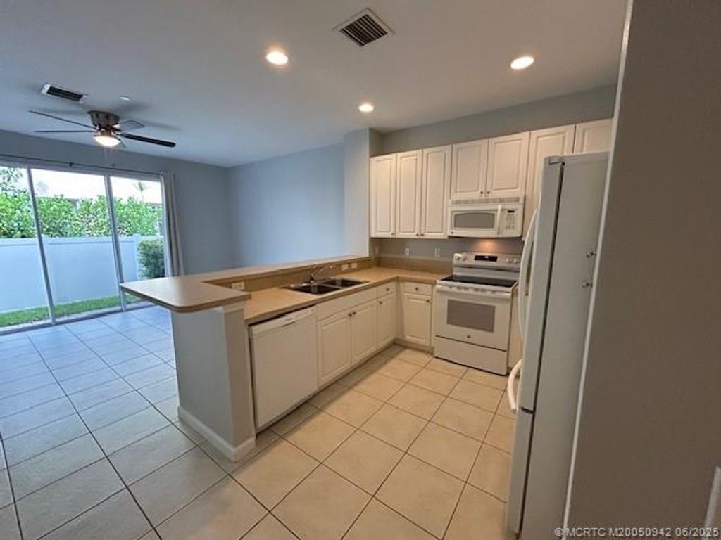 Photo of 9429 SW Purple Martin Way, Stuart, FL 34997 (MLS # M20050942)