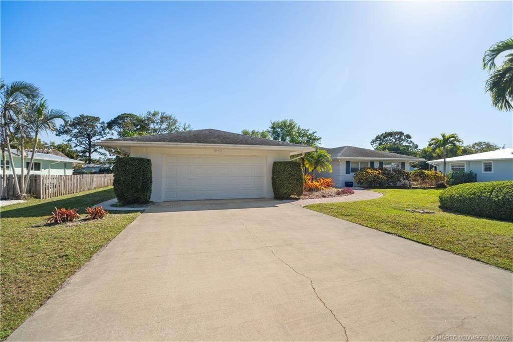 Photo of 853 NW Spruce Ridge Drive, Stuart, FL 34994 (MLS # M20049552)