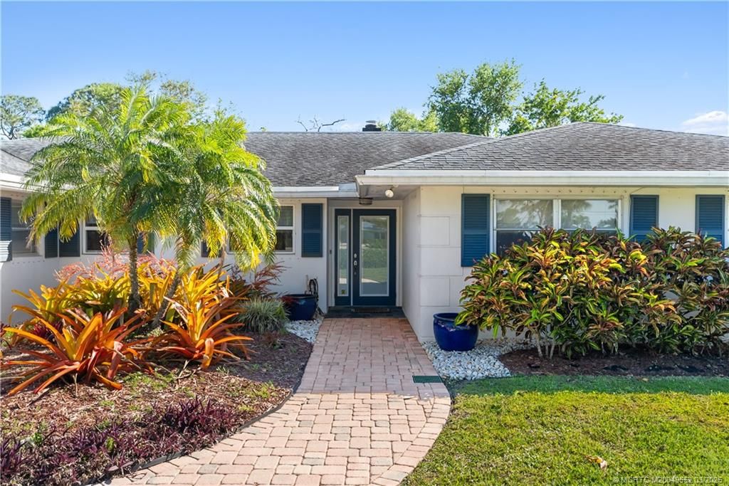 Photo of 853 NW Spruce Ridge Drive, Stuart, FL 34994 (MLS # M20049552)