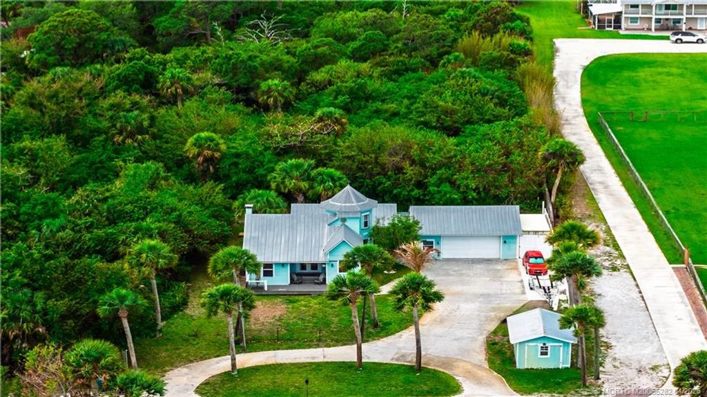 Photo of 11995 S Indian River Drive, Jensen Beach, FL 34957 (MLS # M20055282)