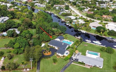Photo of 724 NW Spruce Ridge Drive, Stuart, FL 34994 (MLS # M20053022)