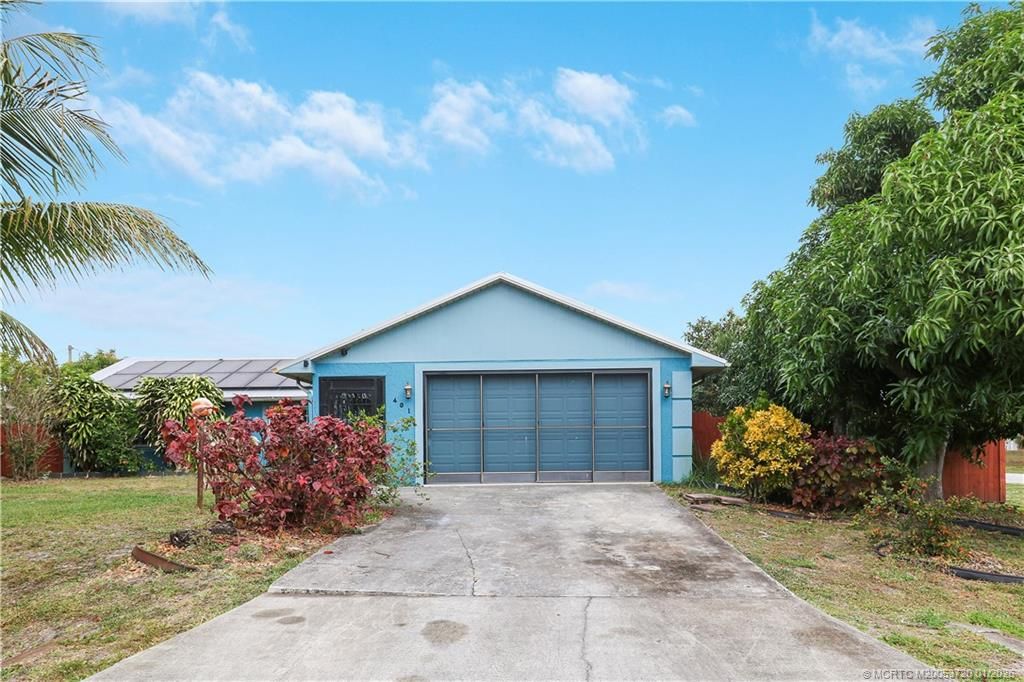 Photo of 401 SW Ewing Avenue, Port Saint Lucie, FL 34983 (MLS # M20053720)