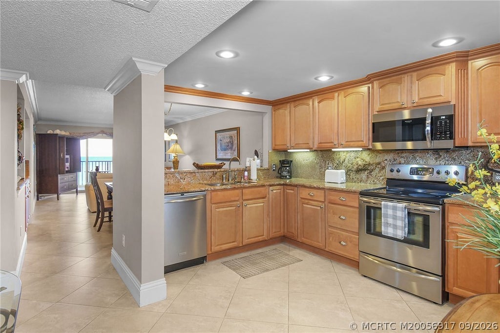 Photo of 10200 S Ocean Drive #302, Jensen Beach, FL 34957 (MLS # M20056917)