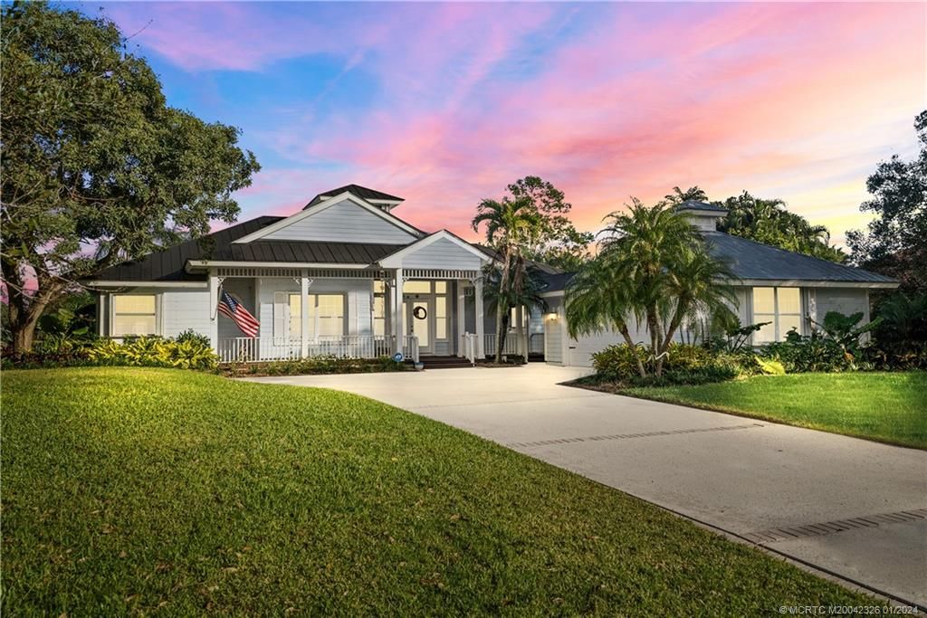 Photo of 5221 SW Orchid Bay Drive, Palm City, FL 34990 (MLS # M20042326)