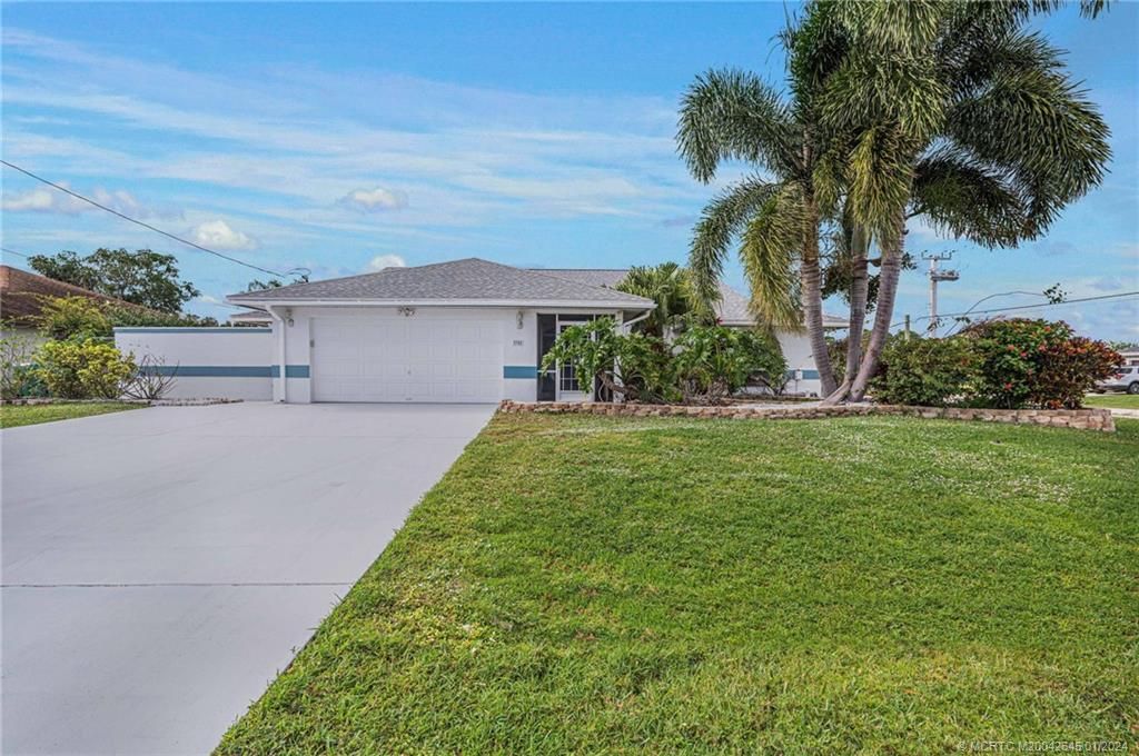 Photo of 2302 SE Marius Street, Port Saint Lucie, FL 34952 (MLS # M20042645)