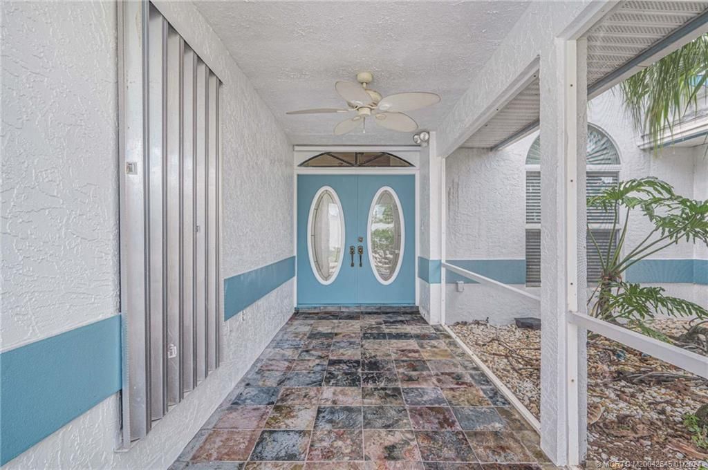 Photo of 2302 SE Marius Street, Port Saint Lucie, FL 34952 (MLS # M20042645)