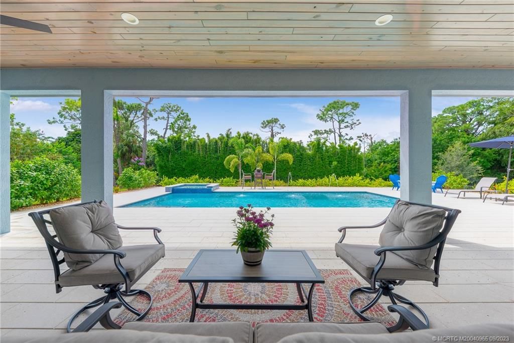 Photo of 535 SW Squire Johns Lane, Palm City, FL 34990 (MLS # M20040965)