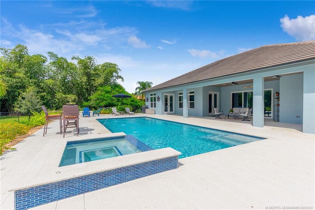 Photo of 535 SW Squire Johns Lane, Palm City, FL 34990 (MLS # M20040965)