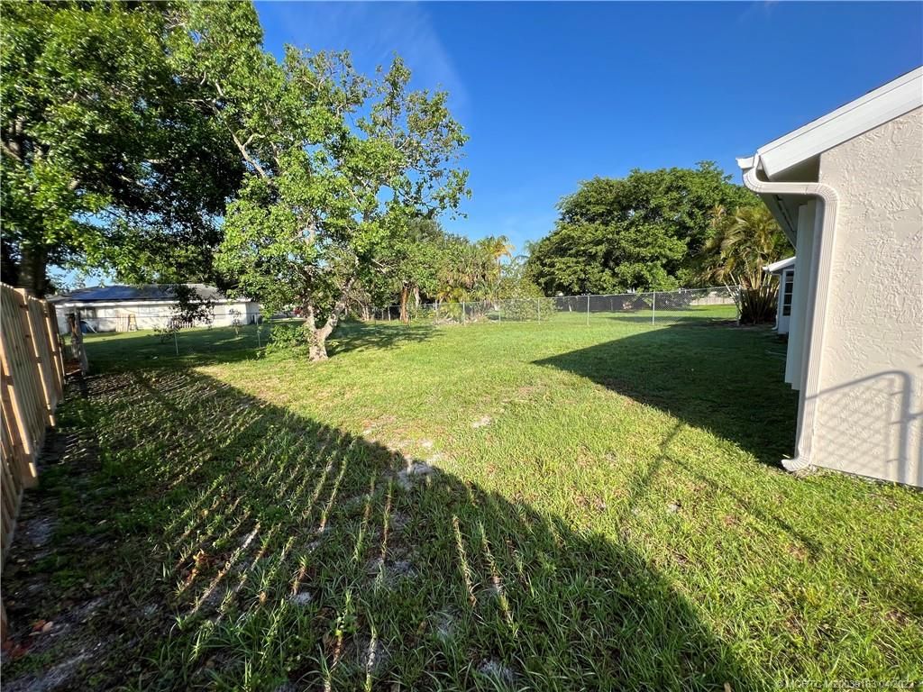 Photo of 1322 SE Roanoke Street, Port Saint Lucie, FL 34952 (MLS # M20039183)