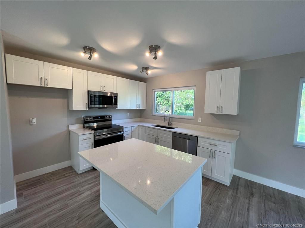 Photo of 1322 SE Roanoke Street, Port Saint Lucie, FL 34952 (MLS # M20039183)