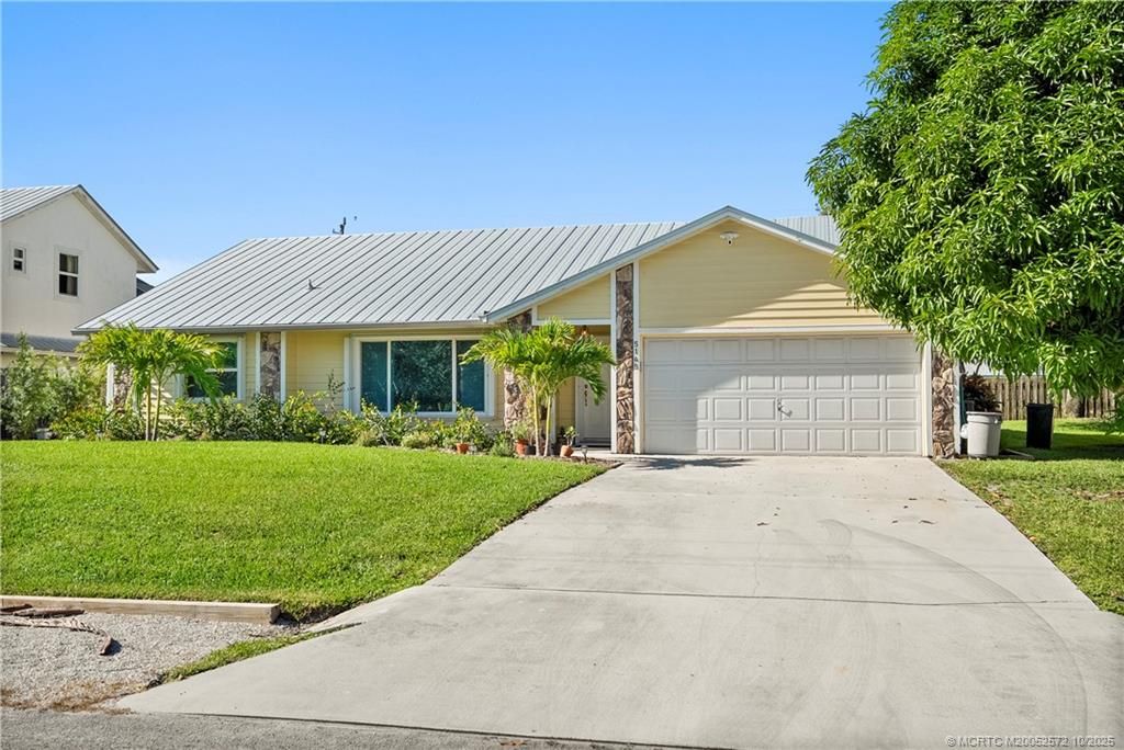 Photo of 5145 SE Matousek Street, Stuart, FL 34997 (MLS # M20052572)