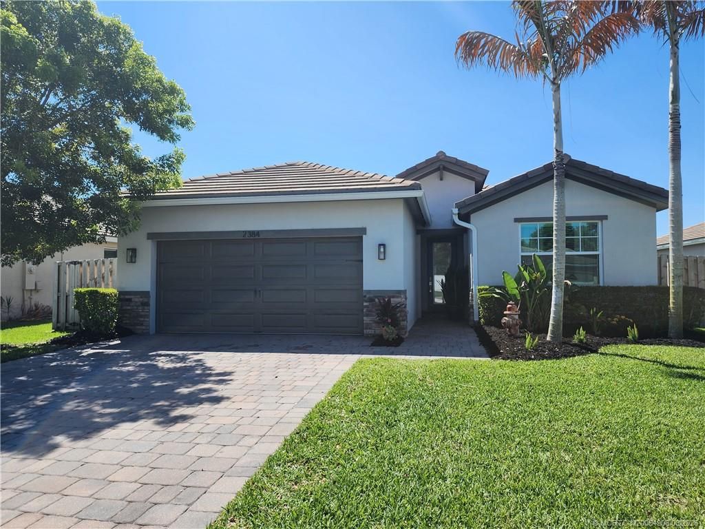 Photo of 2384 SW Strawberry Terrace, Palm City, FL 34990 (MLS # M20054906)