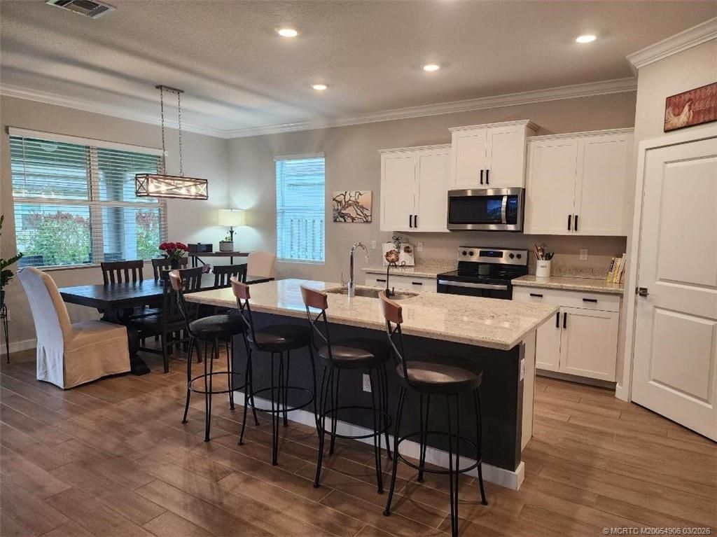 Photo of 2384 SW Strawberry Terrace, Palm City, FL 34990 (MLS # M20054906)