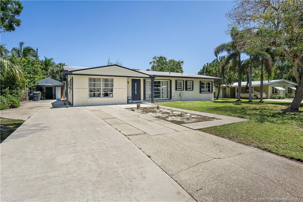 Photo of 821 SE Stafford Drive, Stuart, FL 34996 (MLS # M20039008)