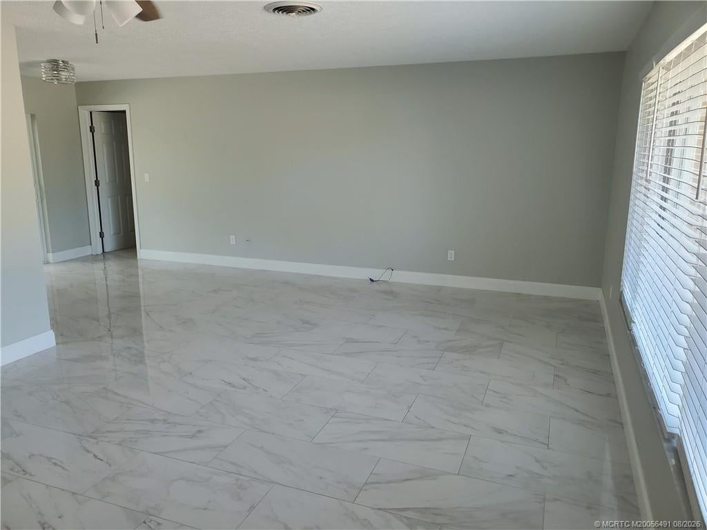 Photo of 1257 NE Sago Drive, Jensen Beach, FL 34957 (MLS # M20056491)