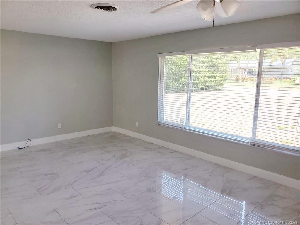 Photo of 1257 NE Sago Drive, Jensen Beach, FL 34957 (MLS # M20056491)