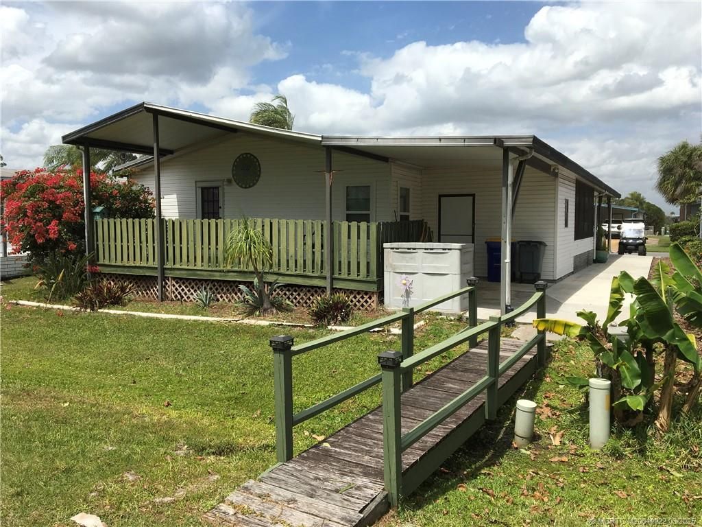 Photo of 16132 Five Wood Way SW, Indiantown, FL 34956 (MLS # M20049922)