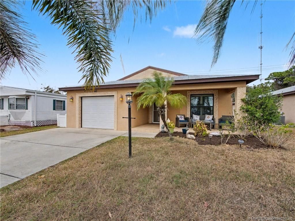 Photo of 40 Mediterranean Boulevard N, Port Saint Lucie, FL 34952 (MLS # M20054429)