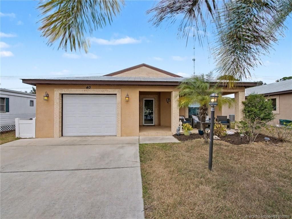 Photo of 40 Mediterranean Boulevard N, Port Saint Lucie, FL 34952 (MLS # M20054429)