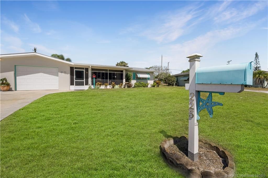 Photo of 225 E Arbor Avenue, Port Saint Lucie, FL 34952 (MLS # M20038682)