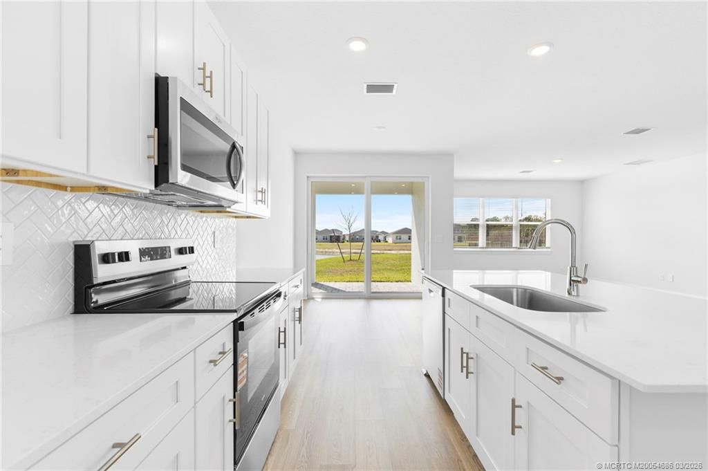 Photo of 11310 NW Blockbird Drive, Port Saint Lucie, FL 34987 (MLS # M20054686)