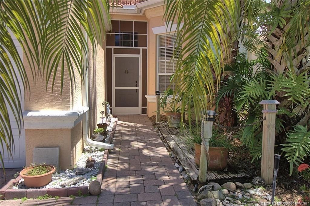 Photo of 3755 NW Deer Oak Drive, Jensen Beach, FL 34957 (MLS # M20051553)