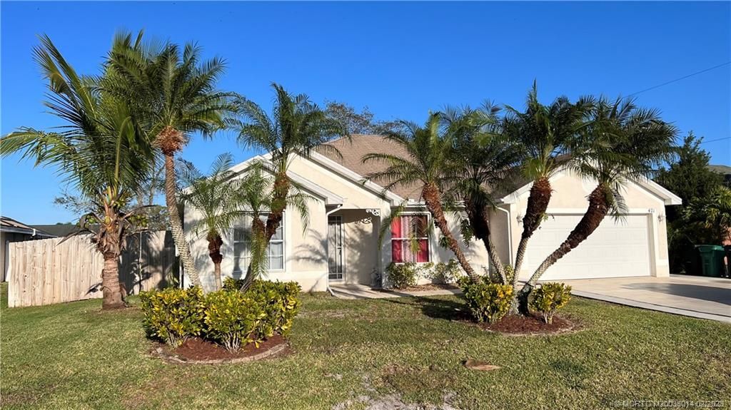 Photo of 471 NW Raymond Lane NW, Port Saint Lucie, FL 34983 (MLS # M20038014)