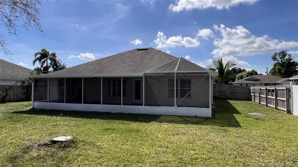 Photo of 471 NW Raymond Lane NW, Port Saint Lucie, FL 34983 (MLS # M20038014)