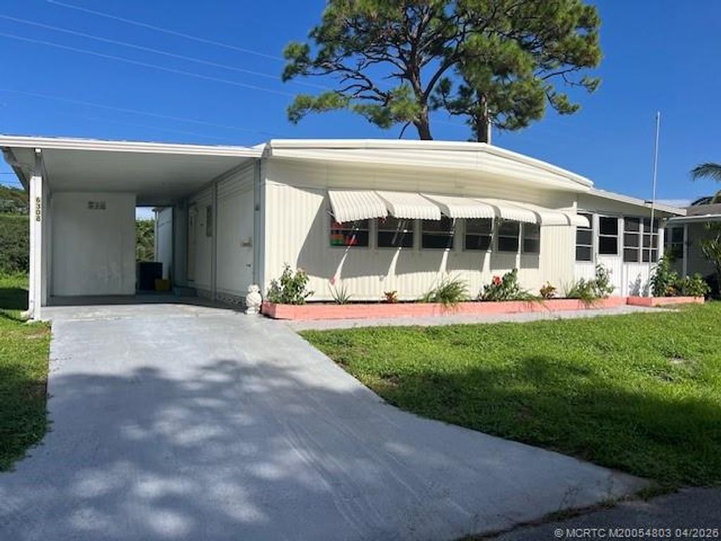 Photo of 6308 S Ash Lane, Lantana, FL 33467 (MLS # M20054803)