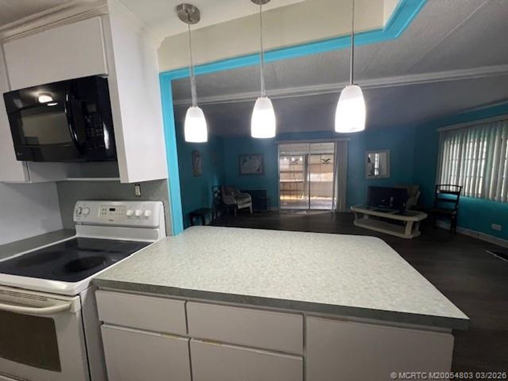 Photo of 6308 S Ash Lane, Lantana, FL 33467 (MLS # M20054803)